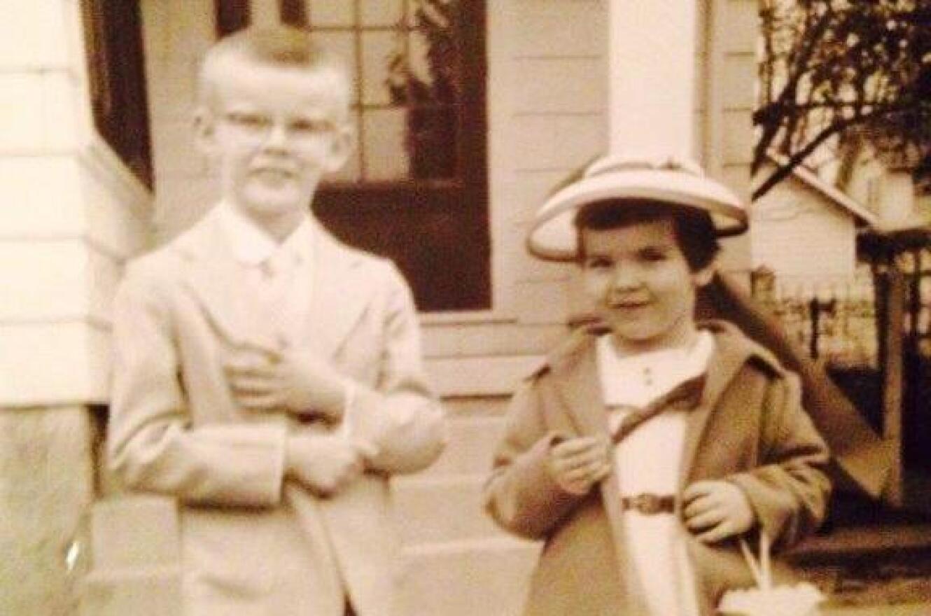 Howard Wilkinson and his sister Barbara - who is likely to get mad at him for this - outside their Dayton home on Easter circa 1960.
